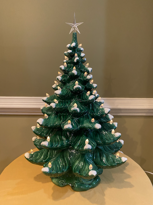 Green Christmas Tree with White Lights and Classic Base