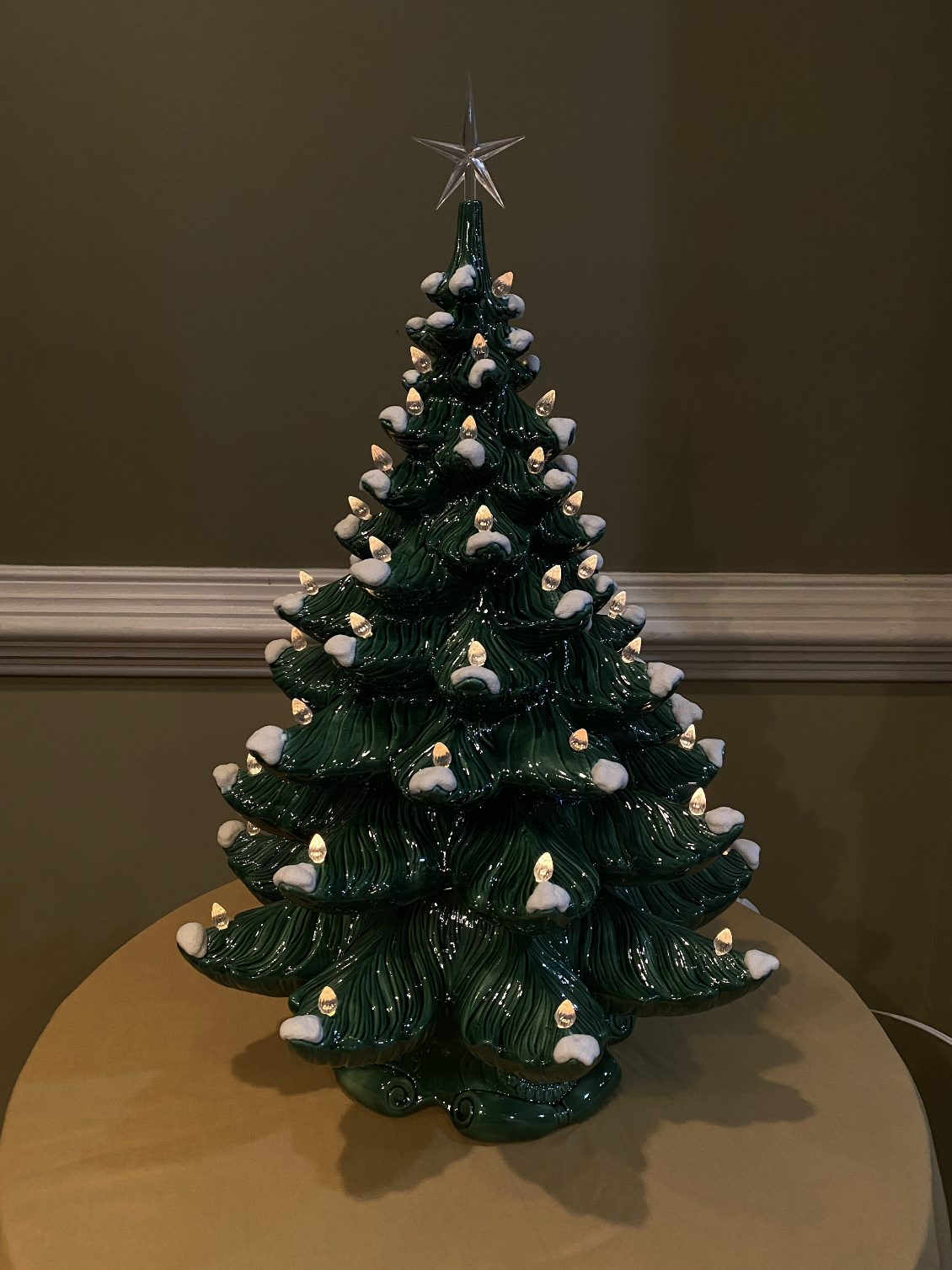 Green Christmas Tree with White Lights and Classic Base