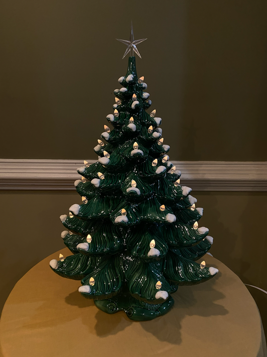 Green Christmas Tree with White Lights and Classic Base