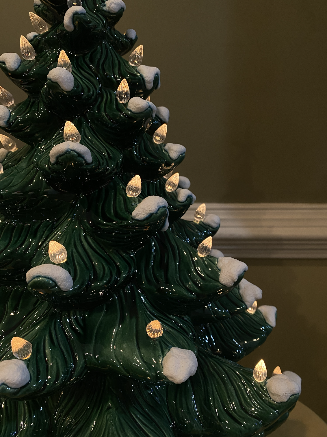 Green Christmas Tree with White Lights and Classic Base
