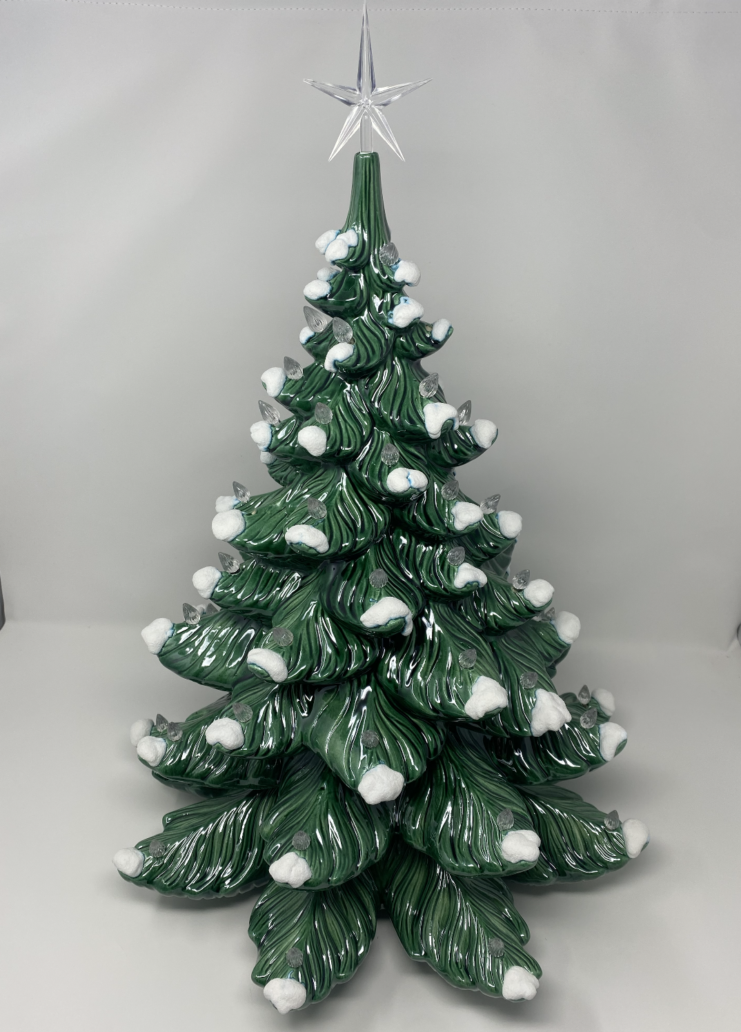 Green Christmas Tree with White Lights and Classic Base