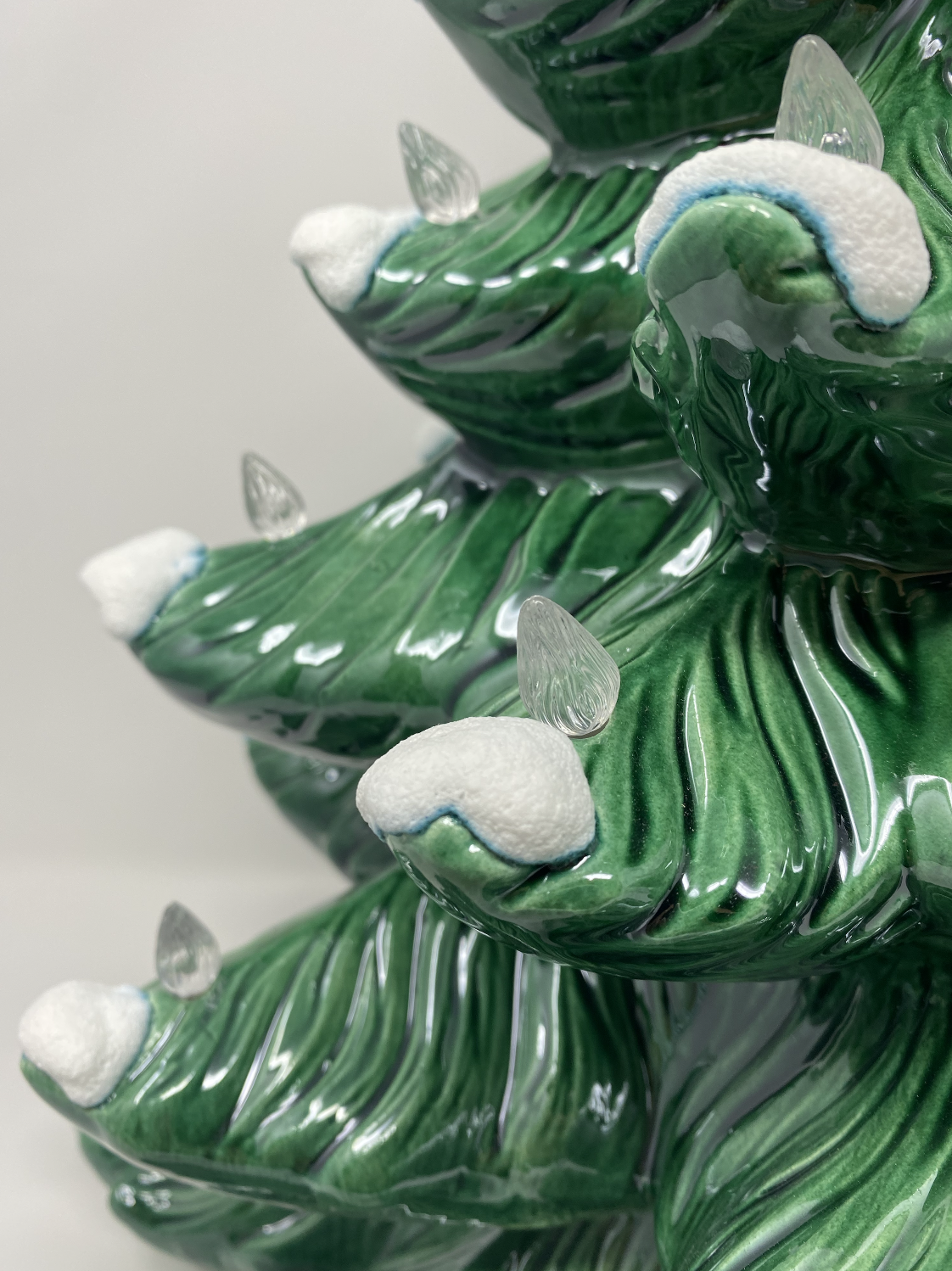 Green Christmas Tree with White Lights and Classic Base
