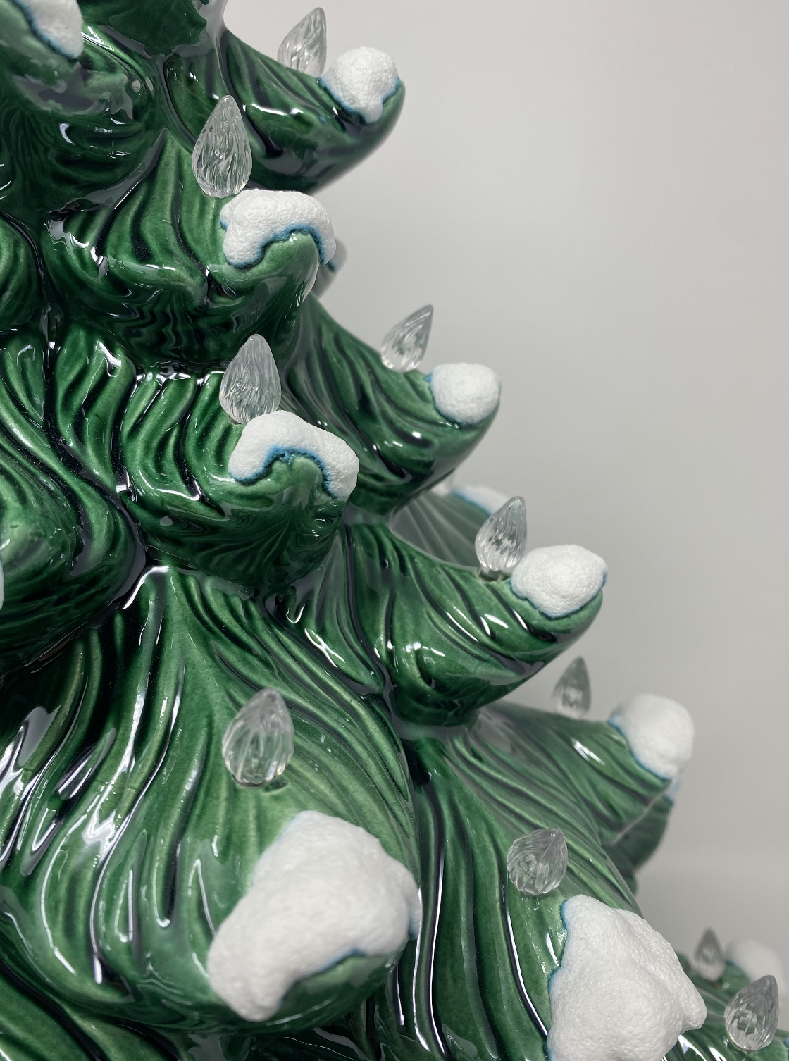 Green Christmas Tree with White Lights and Classic Base